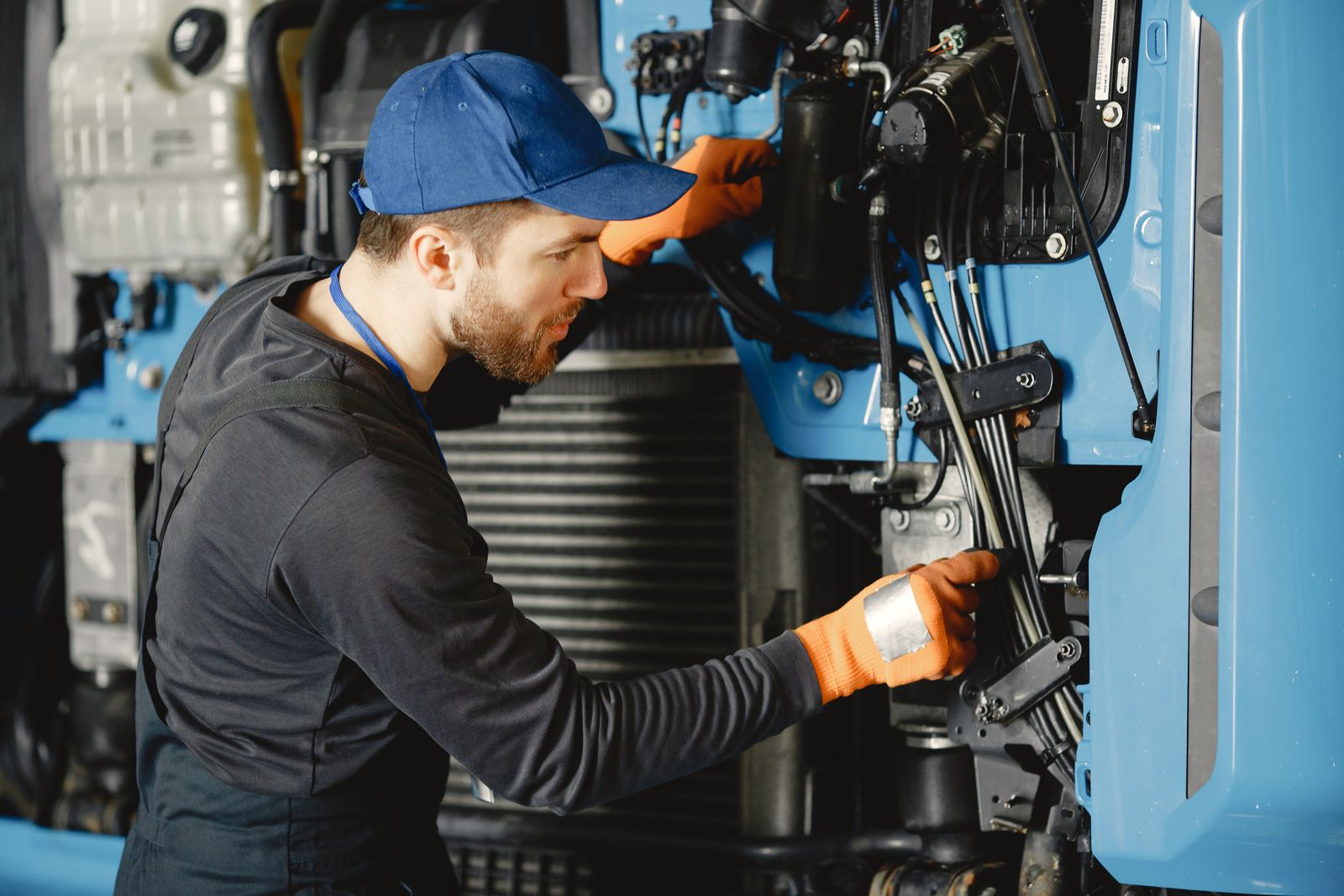 Technician carrying out industrial equipment repair