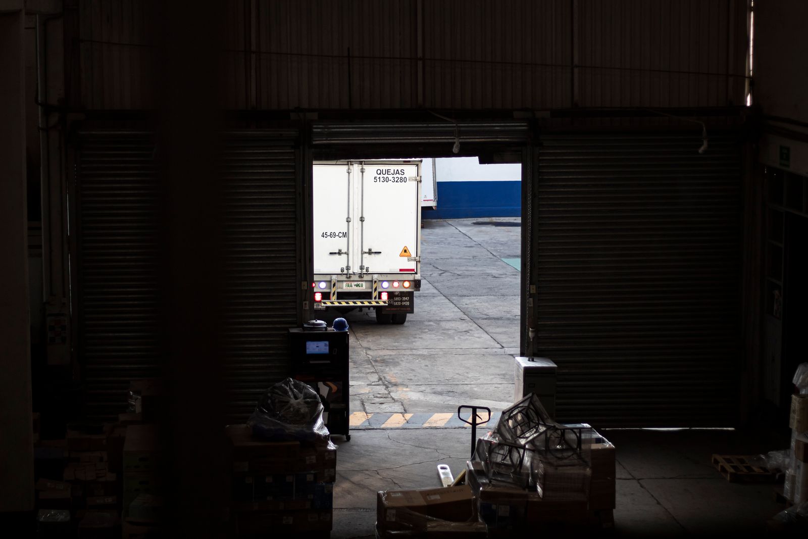 Industrial delivery truck at warehouse dock
